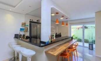 Imagem 6: Casa com 03 dormitórios, 01 suíte, pátio, terraço com churrasqueira e vaga de garagem para