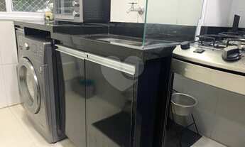 Imagem 5: 2 dormitórios, sendo 1 suíte, 1 banheiro social, sala 2 ambientes, cozinha planejada e áre