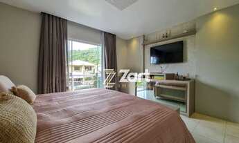 Imagem 5: Casa localizada no Centro de Bombinhas com 3 pisos, 5 quartos sendo 3 suítes