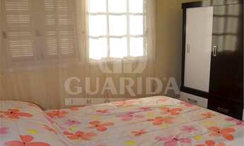 Imagem 3: Casa em Condomínio para comprar no bairro Cavalhada - Porto Alegre com 3 quartos