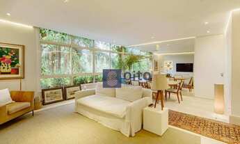 Imagem 2: Este encantador apartamento de 160m², situado no coração do Itaim Bibi, oferece uma combin