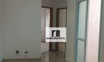 Imagem 2: Apartamento com 2 dormitórios para alugar, 50 m² por R$ 1.500,00/mês - Vila Linda - Santo