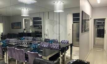 Imagem 7: 2 dormitórios, sendo 1 suíte, 1 banheiro social, sala 2 ambientes, cozinha planejada e áre