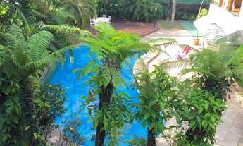 Imagem 5: Casa assobradada com 4 dormitórios sendo suítes, piscina