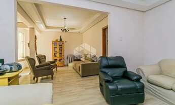 Imagem 2: Apartamento de 113m2, living em 3 ambientes cercado por jardim de inverno