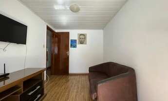 Imagem 3: Casa à venda com quatro quartos, sendo uma suíte