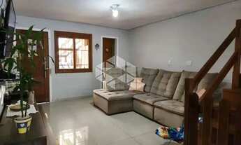 Imagem 5: Casa com 3 dormitórios no bairro Guarujá em Porto Alegre