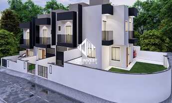 Imagem 3: Sobrado de 3 dormitórios com 1 suíte e garagem coberta em São José/SC