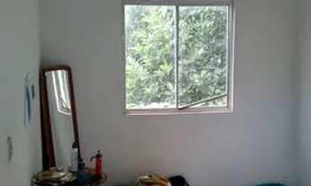 Imagem 2: Casa com um quarto sala cozinha americana