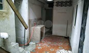 Imagem 7: Terreno amplo com casas, kitnets e quartos