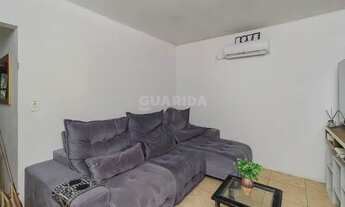 Imagem 2: Casa residencial com 2 dormitórios sendo 1 suíte para alugar no bairro Jardim Botânico