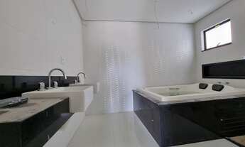 Imagem 7: Casa de condomínio para venda possui 328 metros quadrados com 4 quartos