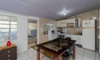 Imagem 7: Casa residencial com 2 dormitórios sendo 1 suíte para alugar no bairro Jardim Botânico