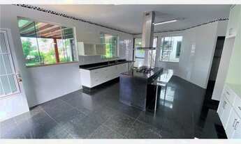 Imagem 3: Casa térrea com 4 suítes e área de lazer na Quadra 04 do Park Way