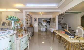 Imagem 3: Casa mobiliada 4 dormitórios (3 suítes), à venda no bairro Três Figueiras, Porto Alegre