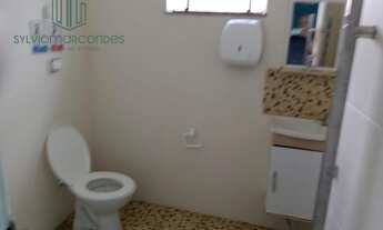 Imagem 3: Casa térrea com três salas comerciais no centro