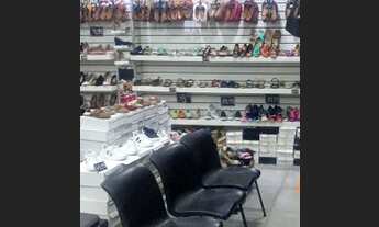 Imagem 2: Passando ponto loja completa ponto movimentado ao lado do trem