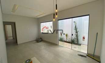 Imagem 3: Casa a venda contando com 3 quartos grandes sendo um suíte, sala ampla em dois ambientes