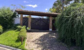 Imagem 3: Casa de condomínio térrea para venda tem 700 metros quadrados com 4 quartos