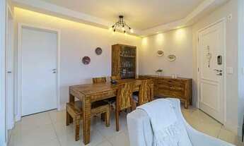 Imagem 3: Apartamento com varanda gourmet e churrasqueira integrada ao living de 102 m², com duas va