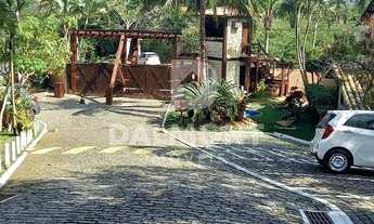 Imagem 2: Casa em condomínio com muito verde