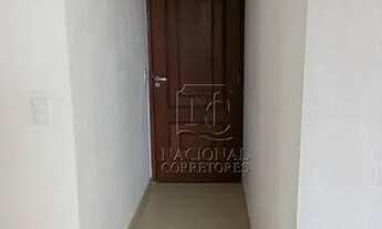 Imagem 2: Apartamento com 2 dormitórios para alugar, 60 m² por R$ 3.093,00/mês - Vila Alzira - Santo