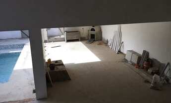 Imagem 3: Casa planejada sob encomenda entrega programada, área gourmet com ilha de granito e armári