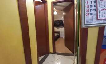 Imagem 2: Casa com prédio comercial