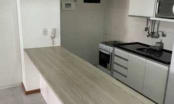 Imagem 2: Quarto e sala totalmente mobiliado próximo a praia