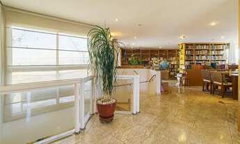 Imagem 7: Cobertura duplex com piscina e churrasqueira e uma vista panorâmica do parque do imbirapue