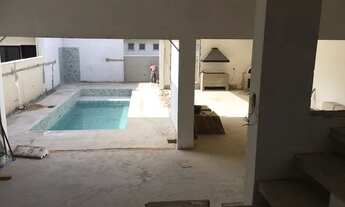 Imagem 3: Casa planejada sob encomenda entrega programada, área gourmet com ilha de granito e armári