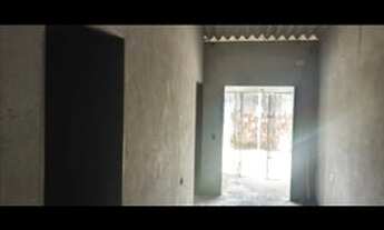 Imagem: Casa com um terreno ao lado os dois com