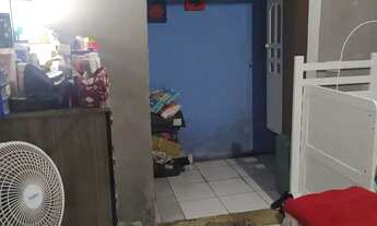 Imagem 6: Casa em rua pública