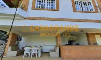 Imagem 2: Casa de condomínio para venda tem 514 metros quadrados com 6 quartos