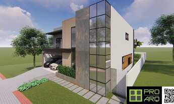 Imagem 2: Casa em condomínio fechado com 4 suítes e um amplo espaço de área aberta plano