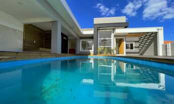 Imagem: Casa alto padrão com três dormitórios