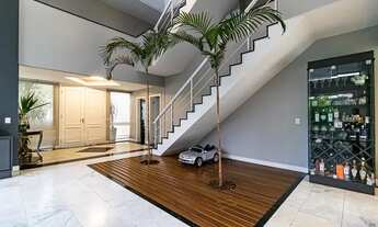 Imagem 2: Casa de condomínio para venda tem 602 metros quadrados com 6 quartos