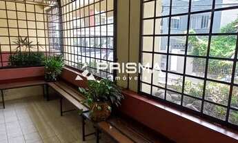 Imagem 2: 2 dormitórios + dependência, sacada e garagem no centro