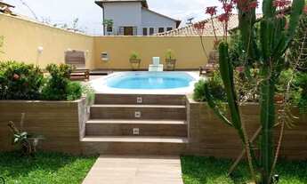 Imagem 4: Casa em condominio com piscina ogiva colada no canal