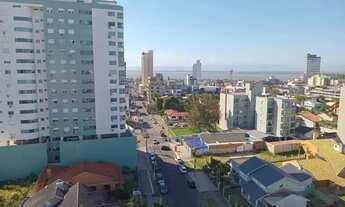 Imagem 2: Imóvel para venda possui 65 metros quadrados com 2 quartos em Centro - Tramandaí - RS