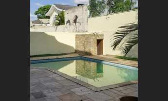 Imagem 2: Linda casa com 450m2, 4 suítes área de Lazer com piscina e churrasqueira excelente localiz