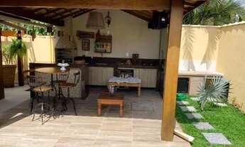 Imagem 5: Casa em condominio com piscina ogiva colada no canal