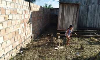 Imagem 2: Casa simples com terreno grande