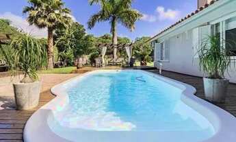 Imagem 6: EXCELENTE CASA COM 3 DORMITÓRIOS, PISCINA E 6 VAGAS DE GARAGEM