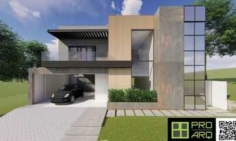 Imagem 4: Casa em condomínio fechado com 4 suítes e um amplo espaço de área aberta plano