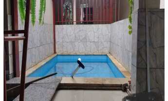 Imagem 6: Casa e um salão comercial