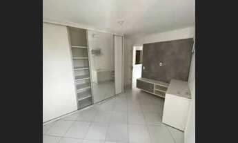 Imagem: Quarto e sala com móveis fixos próximo