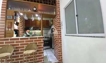 Imagem 3: Apartamento de sala quarto, claro e arejado com cozinha integrada e área de serviço na Gló