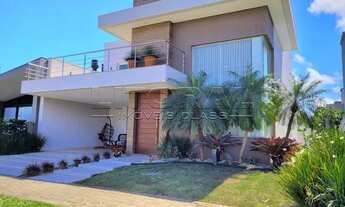 Imagem 2: Sobrado totalmente mobiliado e decorado, 5 suítes, frente para área verde, Condomínio Sea