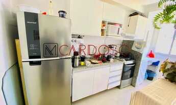 Imagem 5: Ágio de apartamento 02 sendo uma suíte varanda cozinha planejada Samambaia Sul